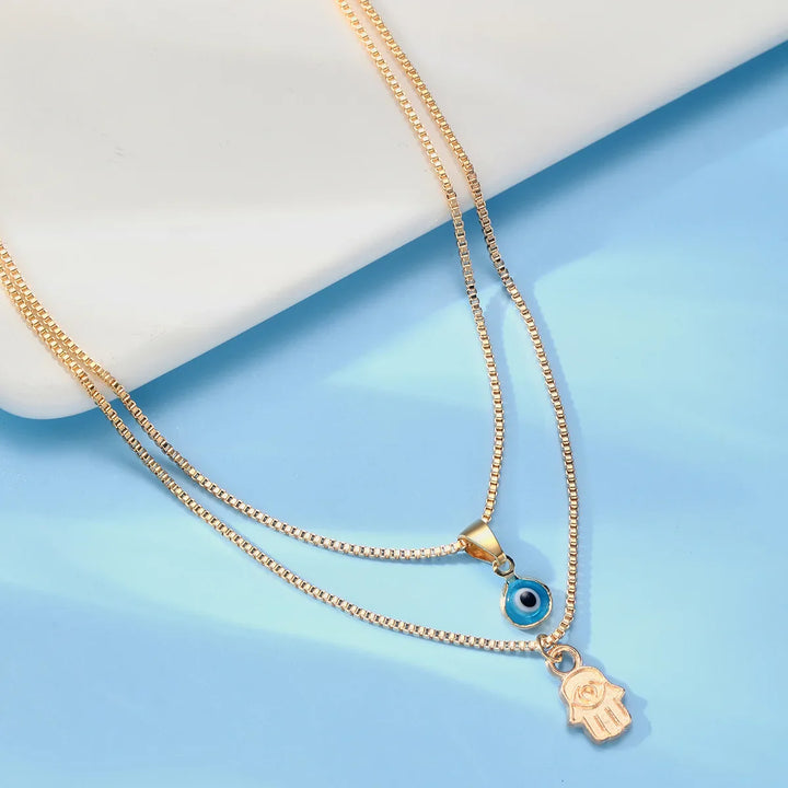 Evil Eye &amp; Hamsa Necklace by weston.®